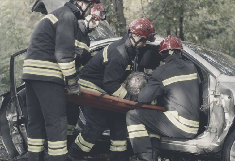 Emergency responders at the scene of a car accident